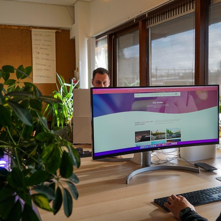 Mobile app project planning workspace with devices and development tools